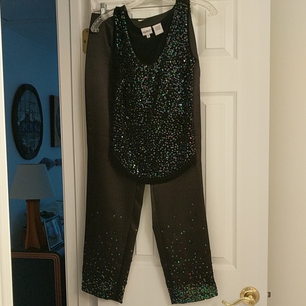 Perfect for a night put!  Sequined Black Pant and top outfit